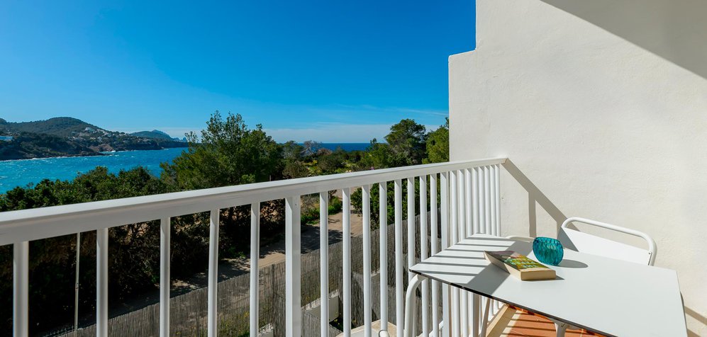 Room image Dubbelkamer met dubbel bed en uitzicht op zee